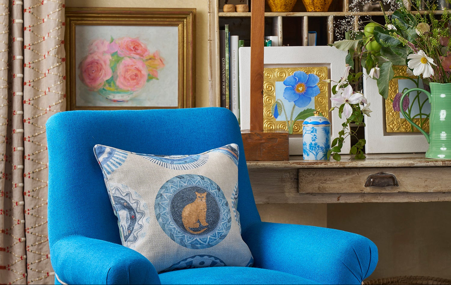 Kit Kemp's new blue tall trees ceramic candle with pink pepper, cedarwood, and purple patchouli scent