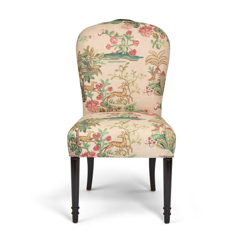 Decorative chair with floral and deer pattern on a white background