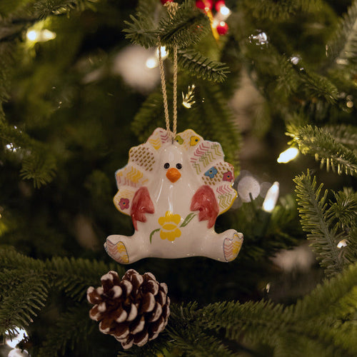 The Timothy Turkey is fine china ornament created by Kit Kemp for Spode, it's a fun and colourful addition to any Christmas tree and festive display.
