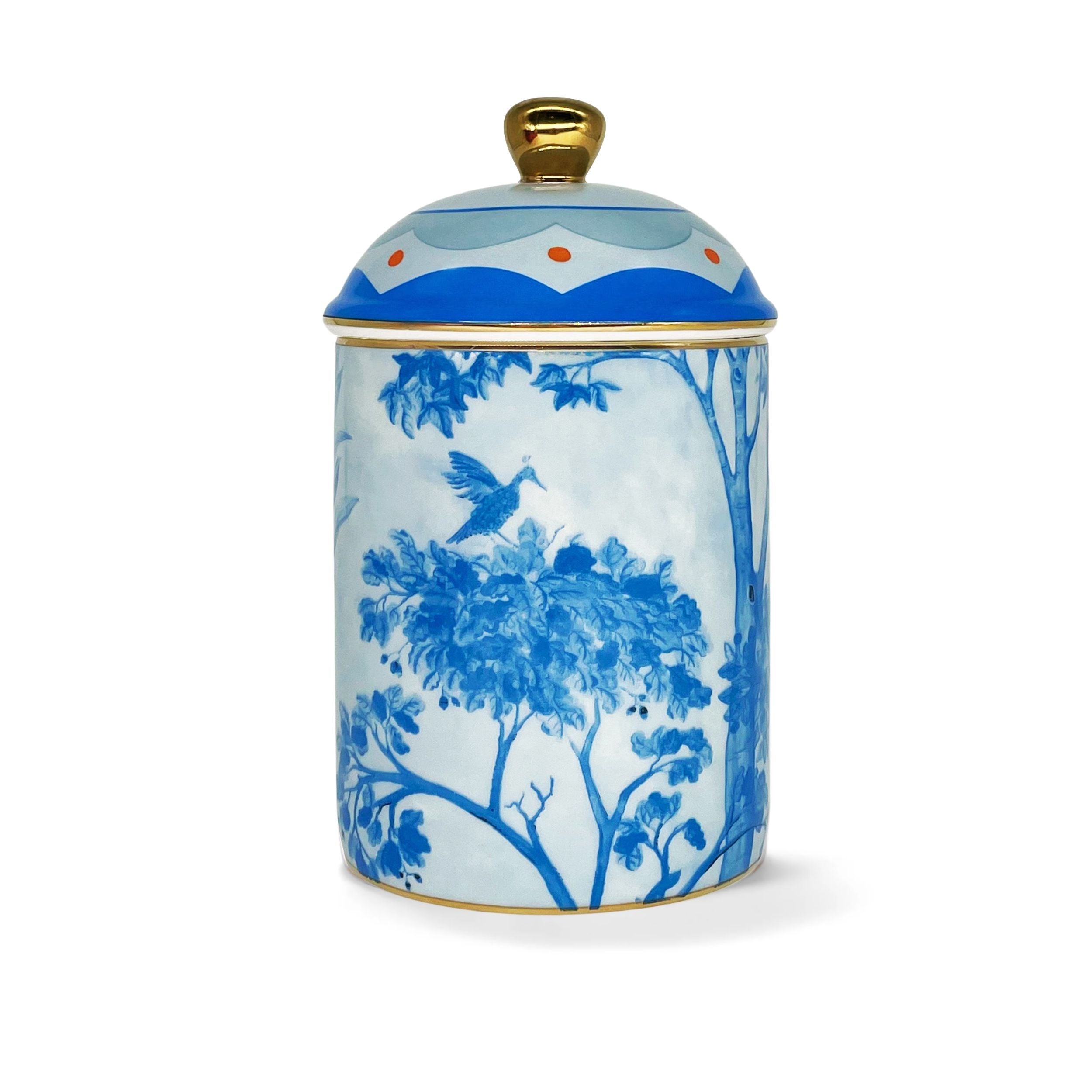 Kit Kemp Tall Trees blue and white ceramic candle with a floral pattern and a gold lid.