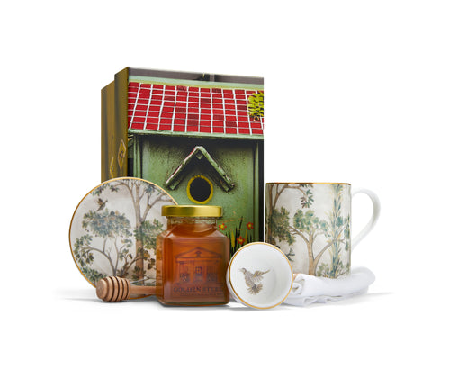 Our Tall Trees Honey Bundle is our unique limited edition gift is offered to you is a real family effort, combining Kit Kemp's new Tall Trees fine bone china mug, ramekin, dish, and mythical bird linen napkin with the first batch of Golden Steel honey with honey comb produced by beekeeper Henry Steel and his friends the London Beekeepers, whose hives are to be found in Hyde park, and illustrated by Willow Kemp,