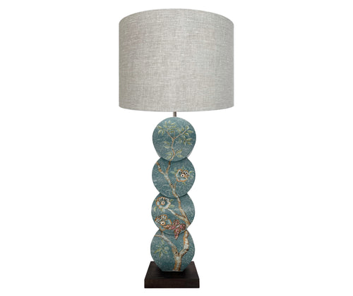 Front view of papillon lamp showing delightful silvery willow trees dance with blooming powder pink roses and burnt orange butterflies against chalky teal skies.