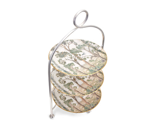 For the ultimate in Afternoon Tea experience, sublimate your fine dining serve ware collection with our silver plated tea stand, adorned with the tall trees fine bone china afternoon tea plates. Seen from above, this image allows you to appreciated the plates which are wrapped in the Tall Trees image of a woodland landscape in soft greens and beiges, and hand-painted in gold banding.
