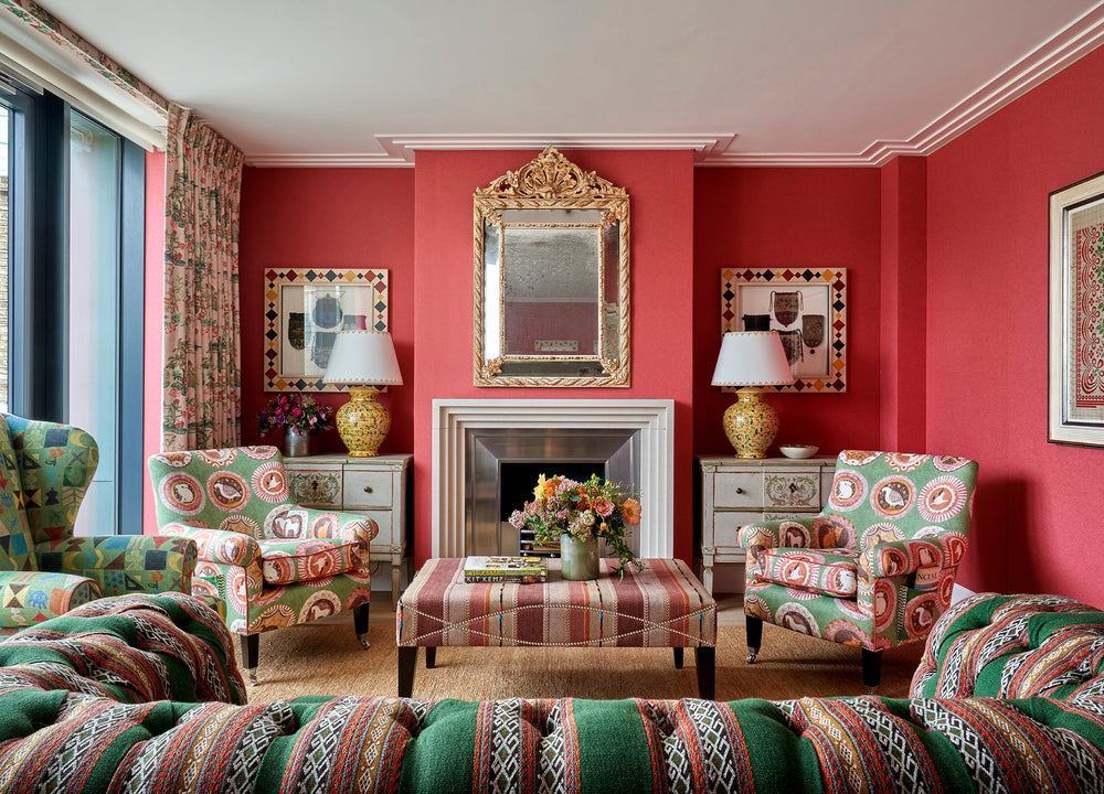 Kit Kemp's trademark upholstered sofa’s chairs and headboards are often seen sporting two or sometimes three different fabrics, upgrading these pieces of furniture into works of art.