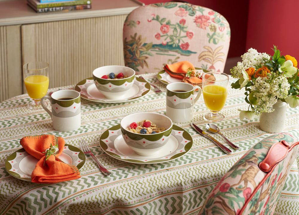 Breakfast tableware, honey, teas, and napkins by Kit Kemp