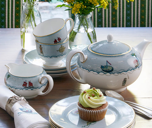 tea pot cup and milk jug