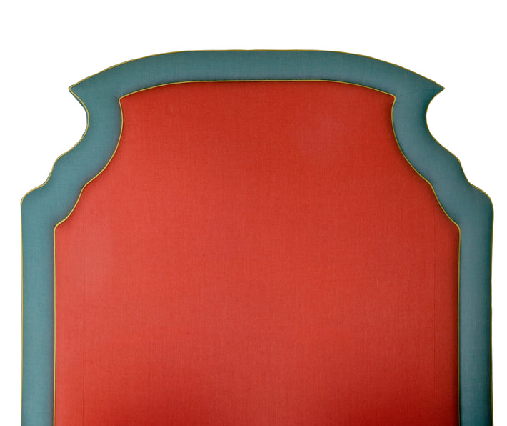 The Ellie head board is shown here in two colour contrast, with outer border in jade green, yellow piping, and the main body of the headboard in a vibrant red linen.