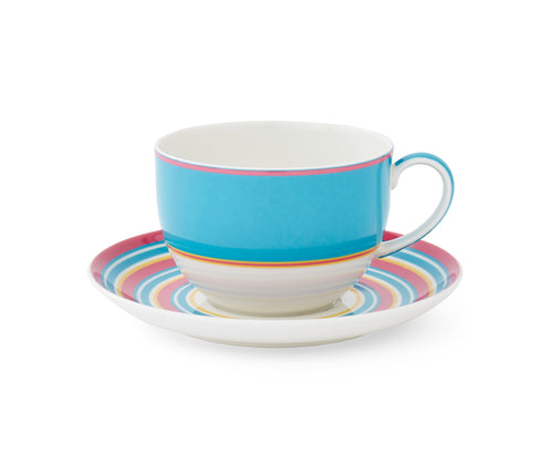 A vibrant splash of turquoise with this colorful cup and saucer from Kit Kemp for Spode. This cup set features a wide turquoise band around the curves of the cup and handle, accented with a pink and yellow stripe. The saucer is filled with colorful stripes