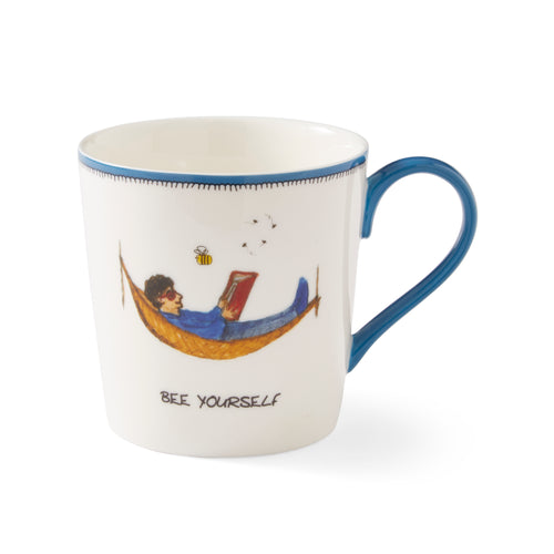 This navy and white doodle mug, featuring a relaxed reader, in his hammock, still chilled despite the bee, trimmed with blue tipping and handle.