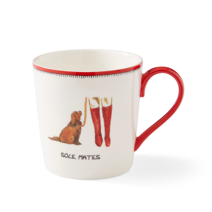 This red and white doodle mug, illustrated with a pair of red boots, and a beloved pet perfectly illustrating the Sole Mates tag line.