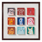 9 Dogs by Holly Frean shows nine small portraits, each dog held within its own square yet clearly part of a group. The backgrounds shift between deep reds, blues and greens, giving the arrangement both warmth and contrast. Painted in oil with a direct, unfussy hand, the faces are simplified yet alert - a series of steady gazes that feel companionable rather than theatrical. The grid gives the work its structure; the individuality of each dog keeps it alive. Exclusive at Shop Kit Kemp.