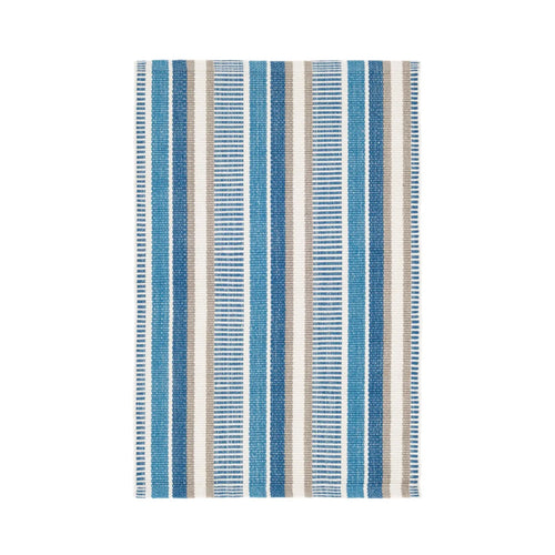 Kit Kemp's Always Greener navy indoor / outdoor rug feels like wool but lasts like iron. Find ultimate satisfaction with a medley of fence post stripes in vibrant, sophisticated hues that add a fresh and bold aesthetic, reflecting light to bring both joy and calmness to a space. Woven in resilient, recycled P.E.T. performance threads, this durable and fade-resistant rug feels as soft as cotton but will stand up to whatever everyday life brings its way.