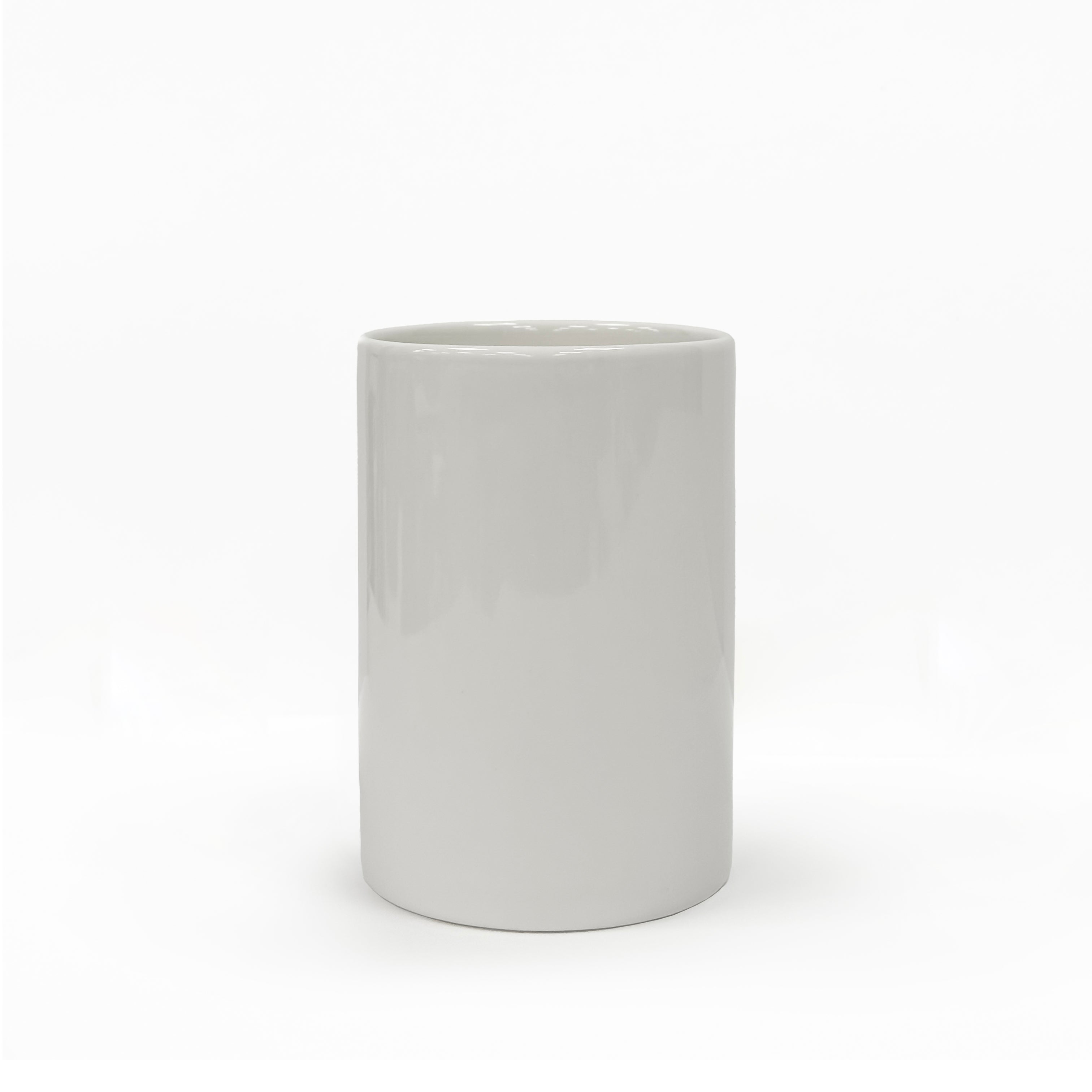 White ceramic bathroom pot for holding essentials, toothbrush, and toothpaste. Clean and modern shape, it sits perfectly with contemporary bathroom suites.