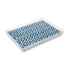 Made in the UK, this acrylic tray features a hand-block printed blue waves motif with intricate kantha hand-embroidery. Exclusively at Shop Kit Kemp.