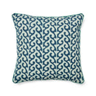 A Kit Kemp Design Studio decorative cushion featuring a hand-block printed blue wave motif. The organic wave pattern is layered with intricate white Kantha hand-embroidery, adding a rich tactile texture. The design is finished with a vibrant turquoise piped edge, creating a playful and luxurious nautical aesthetic.