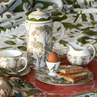 Shop Kit Kemp breakfast tray with tea pot, plates, cups and saucer, and egg cup for dining and table setting.