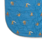 The Buzz Off Quilted Bedspread in Blue, revealing the elegant quilted linen construction, embroidered pattern and softly rounded corners by Kit Kemp for Chelsea Textiles.