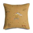 Kit Kemp for the Chelsea Textiles cushion with embroidered bee hives and bees on a yellow, edged in rainbow piping. 