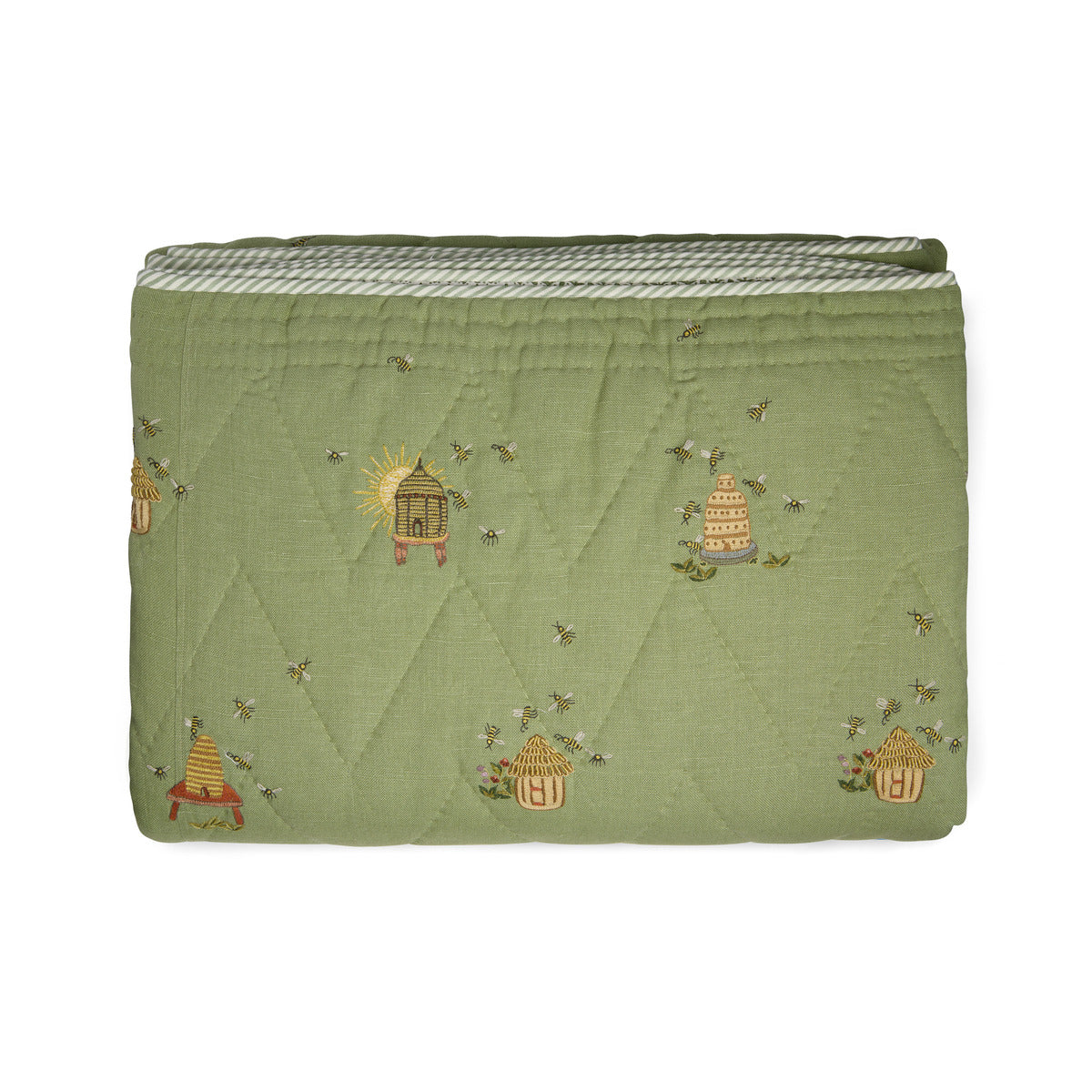 Buzz Off Quilted Bedspread in Green from the Weekend Collection by Kit Kemp - Chelsea Textiles, crafted from quilted linen with embroidered bee and floral motifs and a beautifully bound finish.