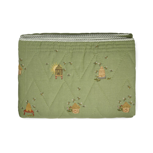Buzz Off Quilted Bedspread in Green from the Weekend Collection by Kit Kemp - Chelsea Textiles, crafted from quilted linen with embroidered bee and floral motifs and a beautifully bound finish.