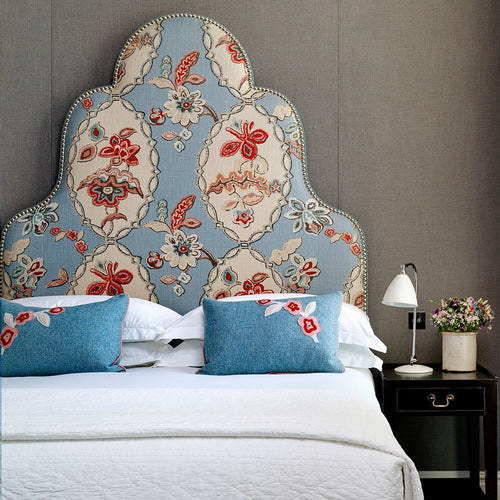  Chainstitch fabric lined headboard, pattern comes from a very large block print repeat from the 1920s, with its interlocking lozenges and botanical details. This generously scaled floral design once carved into wooden blocks is now transferred onto fabric in multiple layers of colour. 