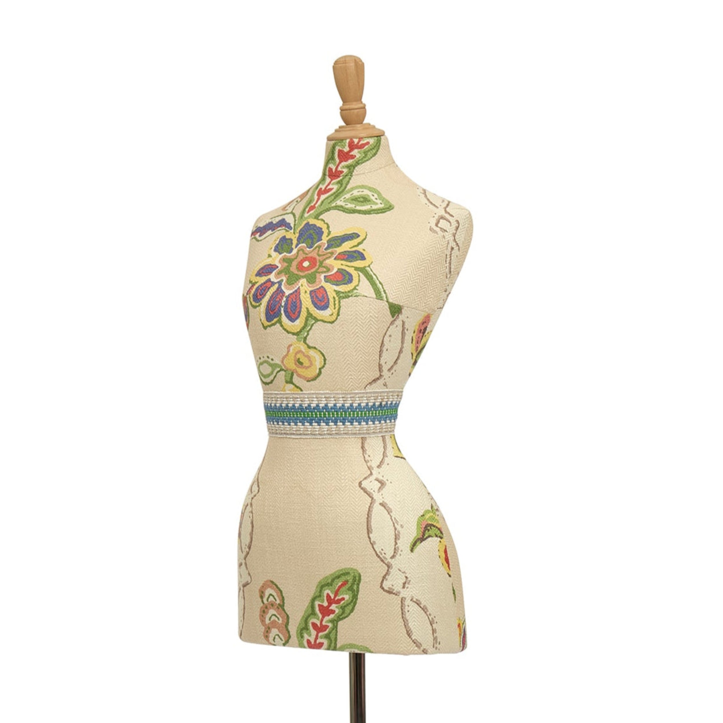 Mannequin torso with floral patterns on a stand against a white background
