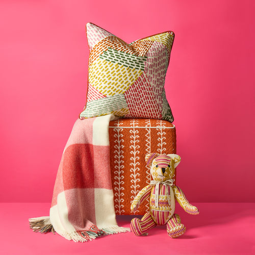 Checkerberry throw pairs perfectly with Kit Kemp's vibrant Running Stitch cushion, and Little Weed stool, with the orange, terracotta, and warm yellow tones to bring warmth and accent colour to any interior.