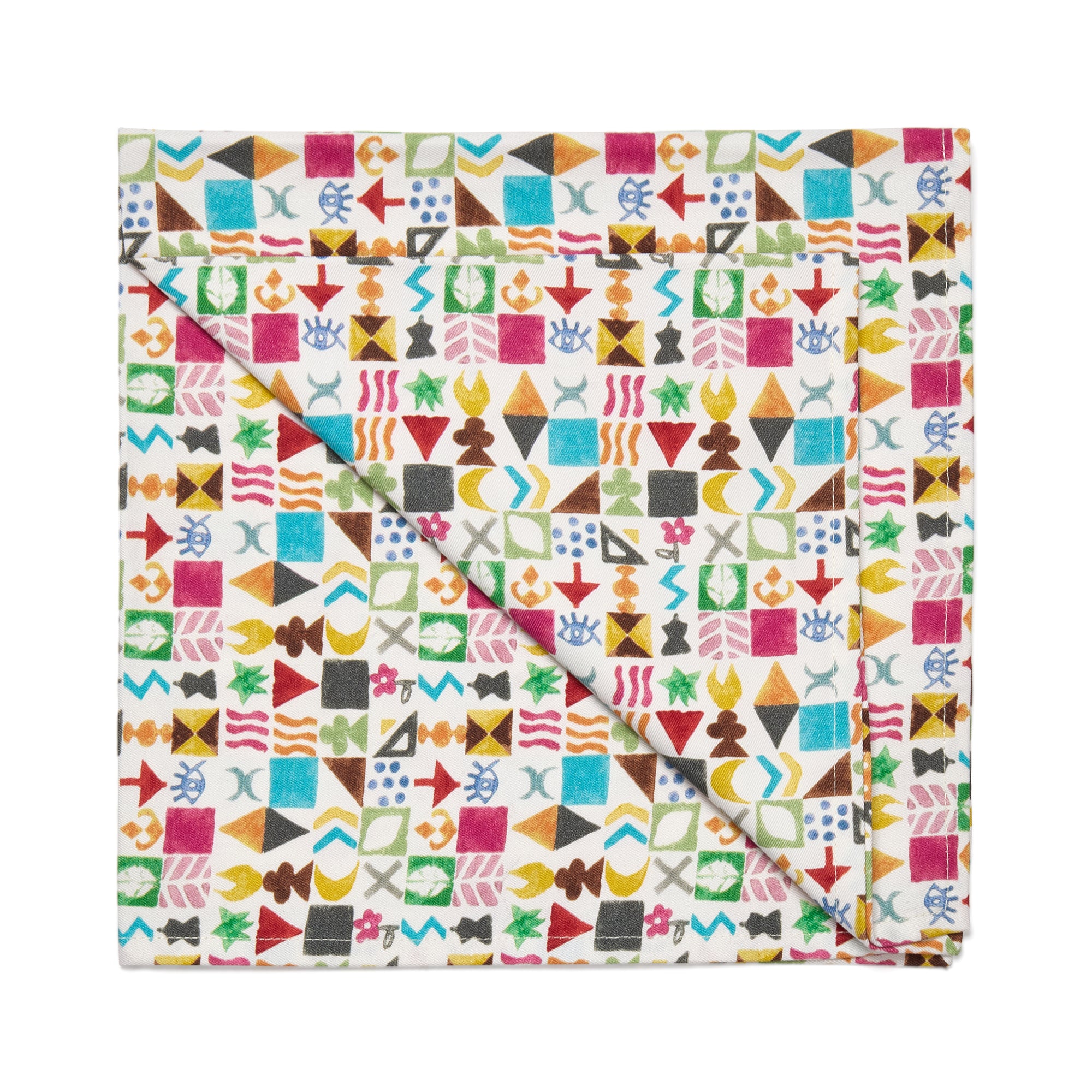 Colorful geometric patterned blanket on a white background