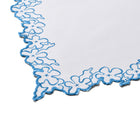 Petal Cutout napkin featuring a detailed blue floral petal border with decorative scalloped cutwork edges. These handmade Indian cotton textiles offer an understated elegance that transitions effortlessly from casual meals to formal gatherings.