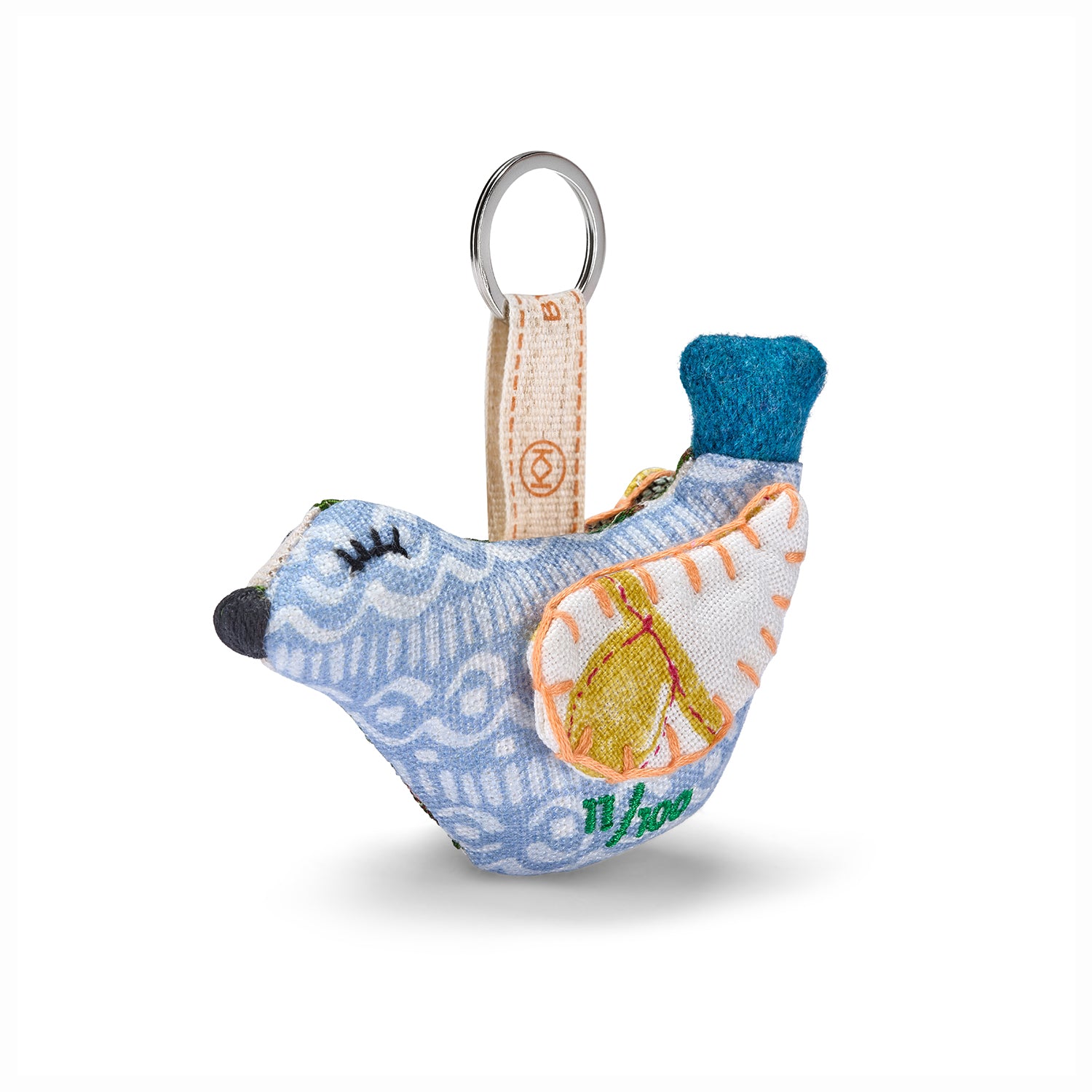 Textile bird-shaped keychain with a patterned body, it looks great as keyring or attached to your favourite handbag or belt.
