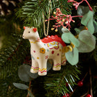 Playful Dragon Heart Dinosaur ornament is a fine china decorative piece perfect for Christmas tree decorations, and perfectly packaged in red and green box for festive gifting. 