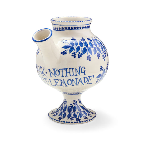 Syrup jar with blue floral patterns and 'Drink Nothing But Lemonade' text handpainted by artist Katrin Moye.