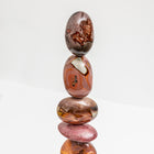 Close up on Earth's Heart totem featuring richly coloured and deeply patterned Polychrome Jasper, each totem is completely unique and created by Celia Lindsell.
