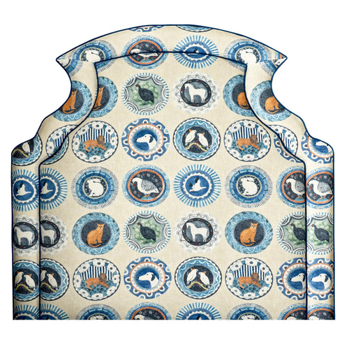 Front view of the Kit Kemp headboard in Ellie style, featuring a confident arc top and scalloped edges, upholstered in Robina's Dinner Party fabric. Exclusively at Shop Kit Kemp