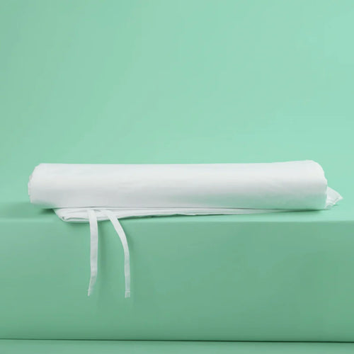 Close-up of the stylish fabric ties on the white duvet cover, showcasing the functional and elegant easy-fastening design of the bed linen set.