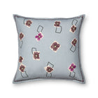 Friendly Flowers cushion designed by Kit Kemp for the Chelsea Textiles, a playful take on delicate flora in violet tones on morning sky blue background.