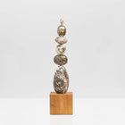 Galaxy Light totem is entirely unique and made from the following precious crystal stones: Pyrite foam, Ocean Jasper, a Moss Agate sphere, Ocean Jasper oval form, all sitting on a spectacular tall form of Ocean Jasper. Oak wood plinth base.