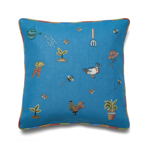 Kit Kemp blue cushions with ducks and chickens, each stitch tracing the swirls of bees and butterflies as they hover among blooms. 100% linen with rainbow piping.