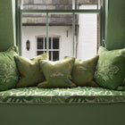 Green theme window bench with upholstery, including the Weekend Collection cushions, each handcrafted with embroidery characters and botanical details.