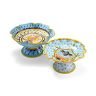 Two pedestal frilled edge dishes by Katrin Moye, A Coat of Arms for Menopause and Manera Curiosa, sold at Shop Kit Kemp