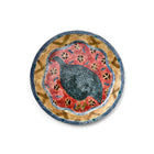 Robina Jack's one of a kind artwork Guinea Fowl with colourful brushstrokes of warm reds and ochre tones showcasing the bird with its textured plumage in the centre.