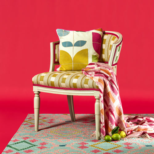 Happy Flowers cushion with Whitby chair and Brick Weave throw, exclusive designs for interiors by Kit Kemp