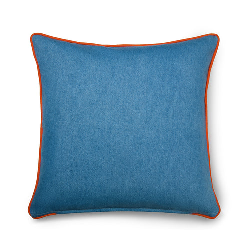 Finished in blue denim style fabric and orange pipe edge, Happy Flowers cushions are perfect for displaying in any direction, to be configured on colourful or as colour block on upholstered furniture. Made in England for Shop Kit Kemp.