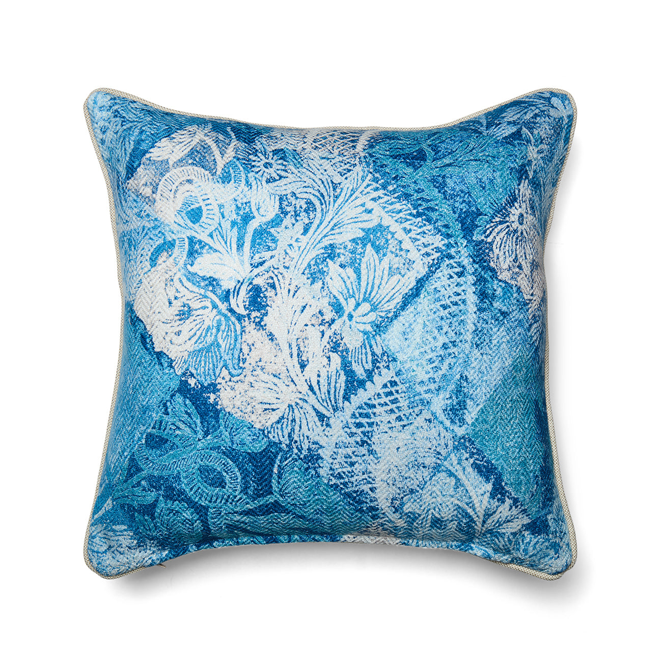 Kit Kemp for Christopher Farr Cloth Harlequin cushion in the cool-toned River Bank indigo blue and sky blue colourway. The fabric features a complex, painterly print with a crisp, denim-like aesthetic.