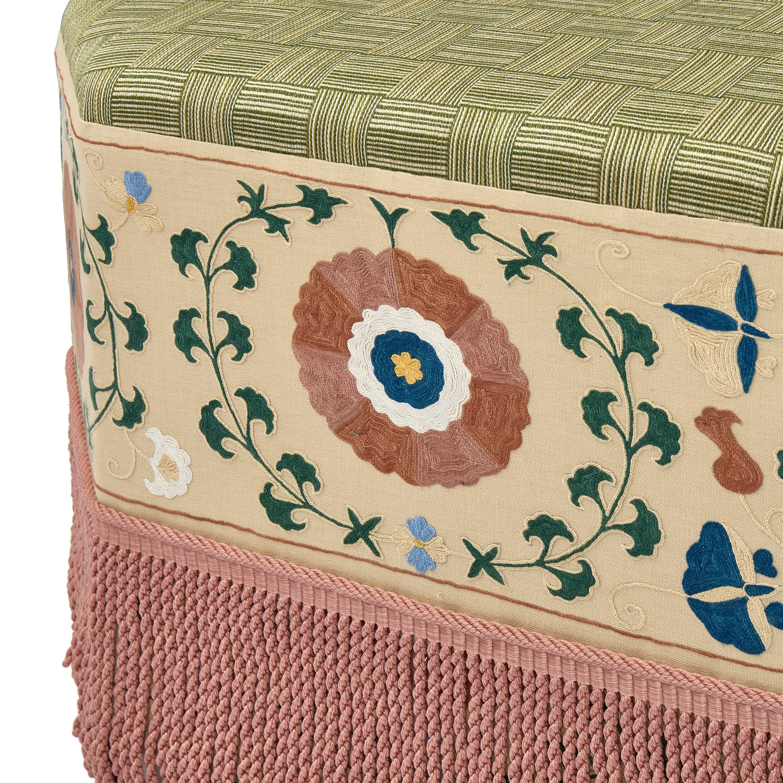 Decorative ottoman with floral embroidery and fringe details