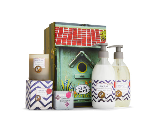 The Lavender Hand Wash Gift Set, pulls together some of the best selling elements of the Lavender Eucalyptus range, full of the scent of an English herb garden's calming blend of essential oils, such as lavender, eucalyptus, lemon balm, & burdock root. Contains a 295ml hand wash, lotion, a 50g soap, & 60g candle. Packed in a olive green gift box, decorated with yellow simple smiling flowers, with a red roofed bird box printed on the lid.