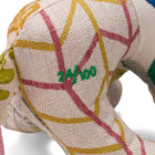 Close-up of a limited edition Lennart the Lion, showcasing the "24/100" green embroidered serial number on its flank. This emphasizes the one-of-a-kind nature of these UK-handmade, eco-friendly creatures.