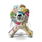 A charming, sustainable Lennart the Lion plush, handmade in the UK. The face is intricately detailed with black whiskers and beady eyes, showcasing a unique personality created through the resourceful use of repurposed textile scraps.