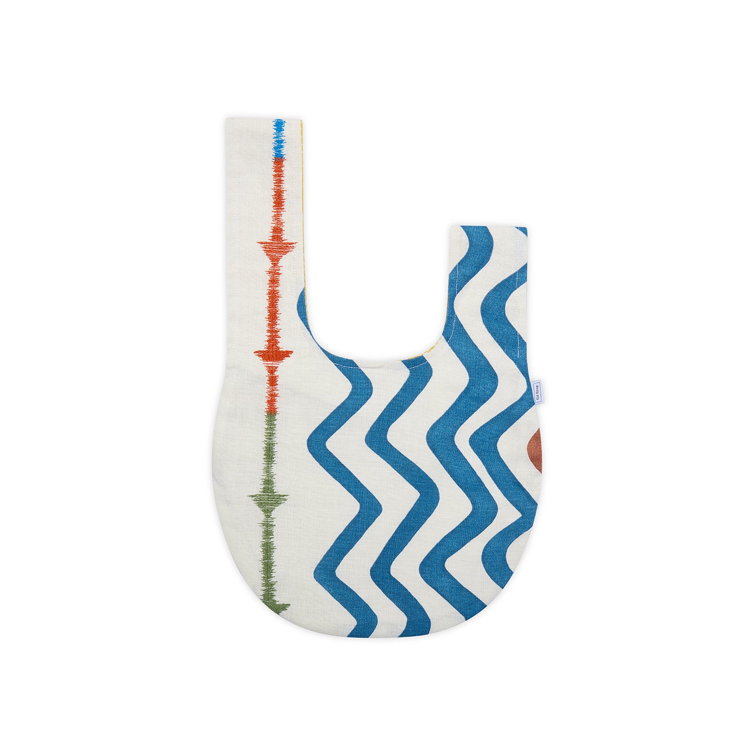 The reversible Rick Rack Loop Bag is crafted from upcycled fabric, featuring striking blue stripes and embroidery on the exterior and vibrant yellow Tweak fabric on the interior. It is the perfect accessory for storing essentials, whether at home or on the go.