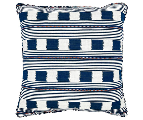 The front of the navy Lost and Found outdoor cushion. The fabric of this cushion is a simple, structured design, with a small repeat. It features a dotted stripe, and repeating squares. Lost And Found can be seen here in the indigo colourway.